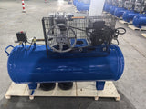 Blue air compressor from Pro garage lifts
